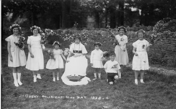 May Queen at Great Rollright, 1938.. A resident recalls how after maypole dancing on the village green, all the children toured Great Rollright on a farm cart carrying garlands of flowers.